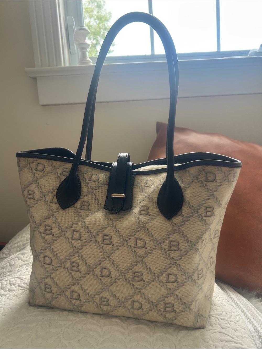 Dooney & Bourke Beige Monogram coated Canvas Tote with Black leather Trim